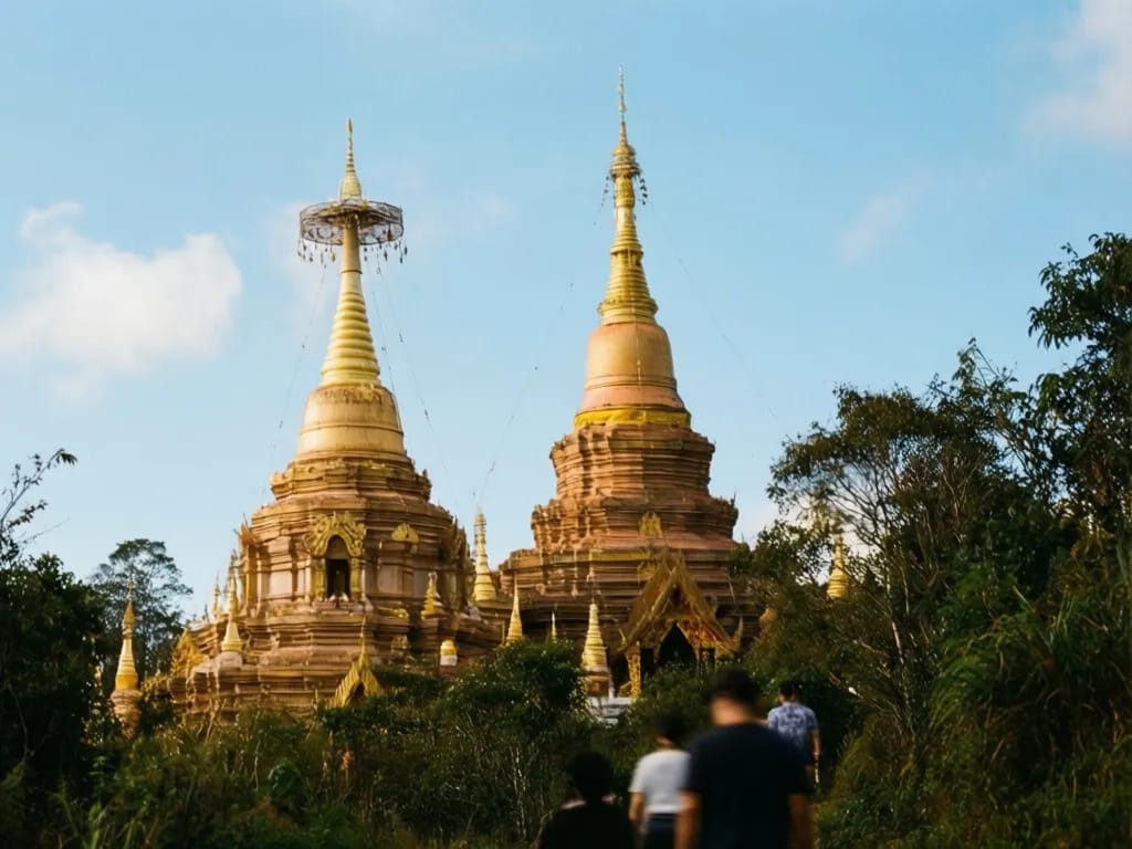 Twin royal chedis from the Kew Mae Pan ridge