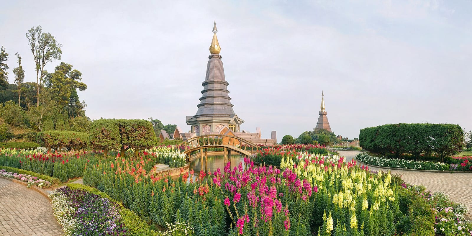 The two royal chedis on Doi Inthanon, surrounded by terraced flower gardens in bloom