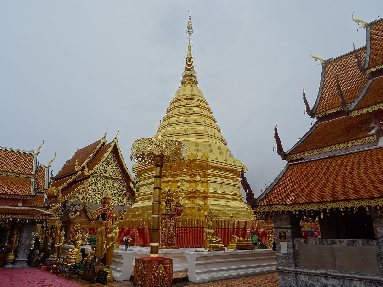 Gilded chedi of Wat Phra That Doi Suthep rising above the temple's upper terrace