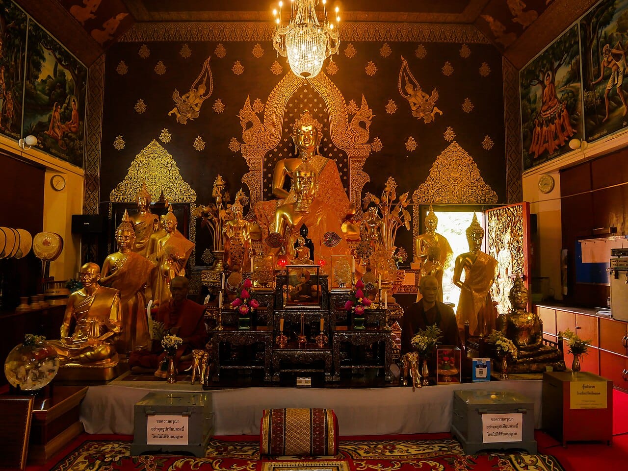 Principal Buddha image on the gilded altar inside the main viharn of Wat Jed Yod