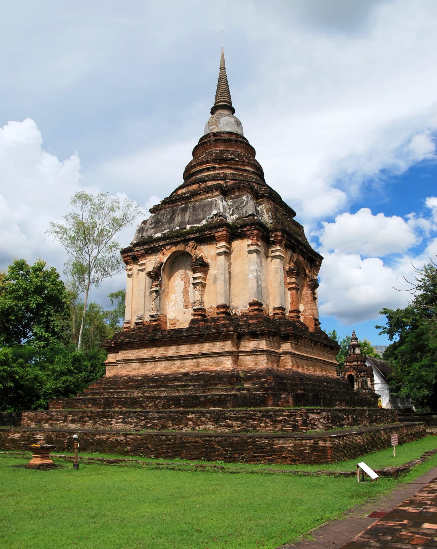 Weathered brick chedi at the back of the compound containing the ashes of King Tilokaraj